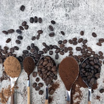 espresso beans on spoons