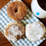 cinnamon sugar donut and powdered sugar donut with blue bottle coffee