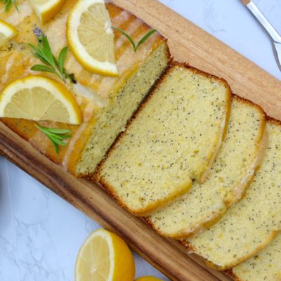 lemon poppy seed loaf cake on marble