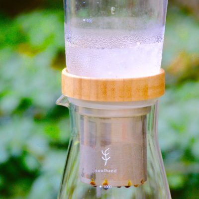 closeup of soulhand cold brew coffee maker with ice on the top