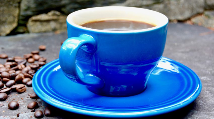 blue coffee cup and saucer cement