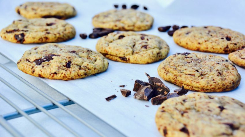 dark chocolate espresso cookies laying down on parchment paper